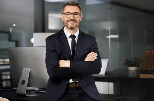 confident-portrait-mature-businessman-office-600nw-2453209099